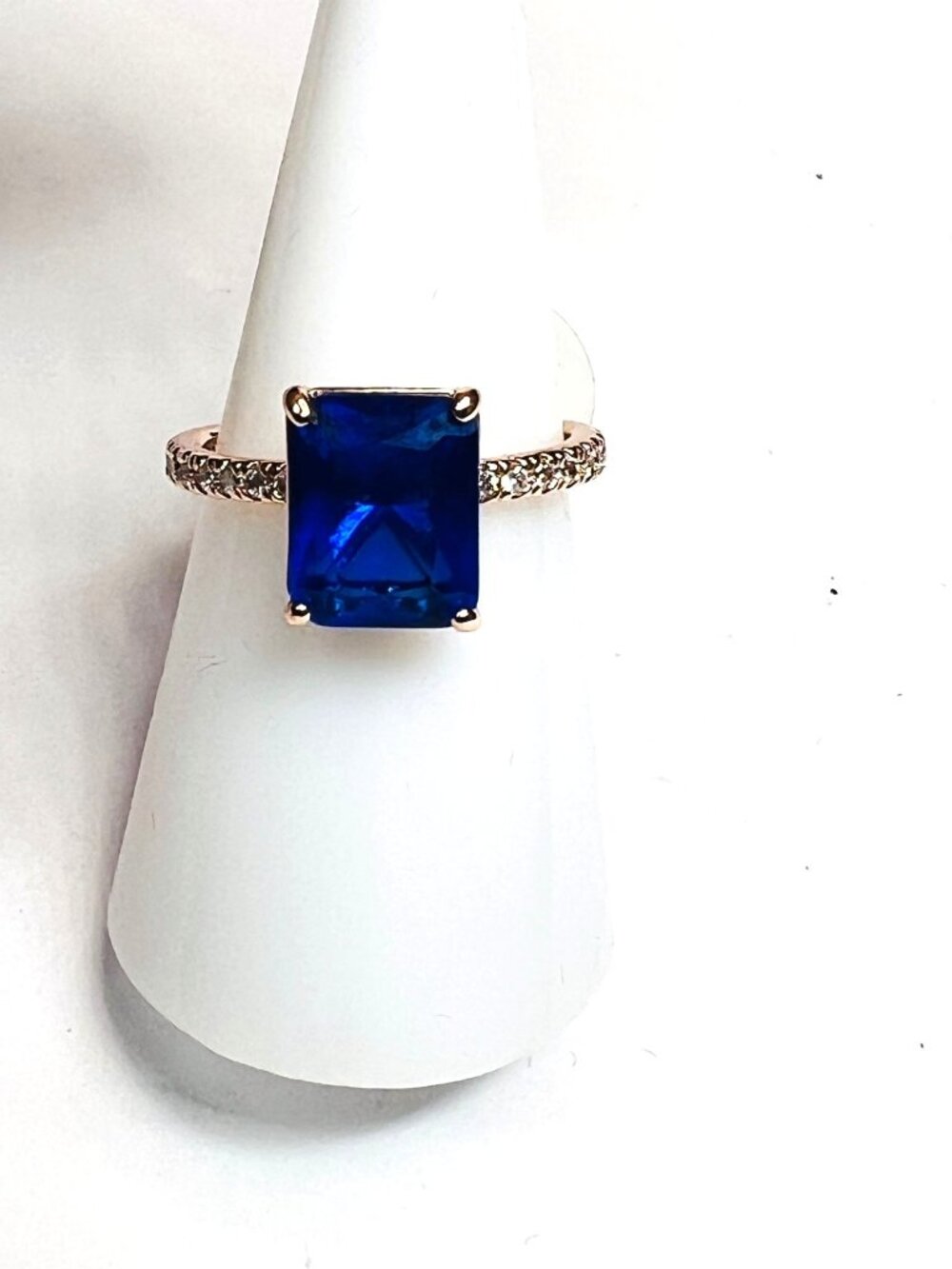 Ring Bomb Party Ring size 7 deep blue stone rose gold color band